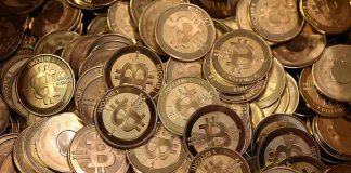 Il marchio di Bitcoin su alcune monete