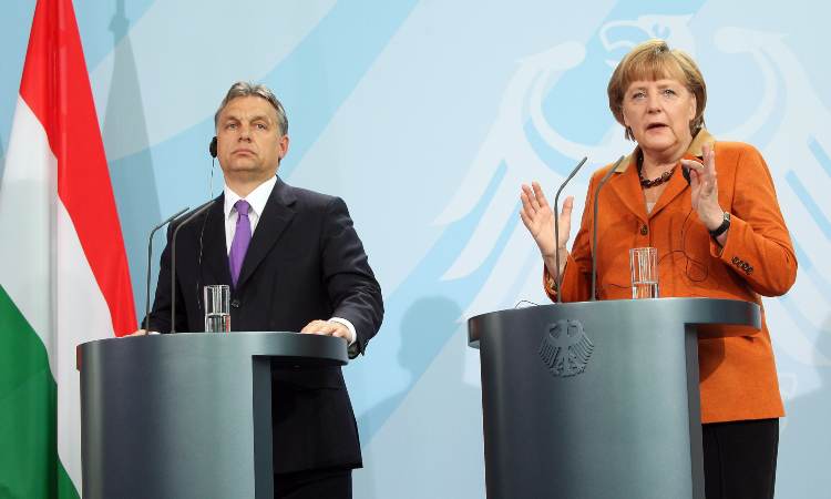 Viktor Orban e Angela Merkel