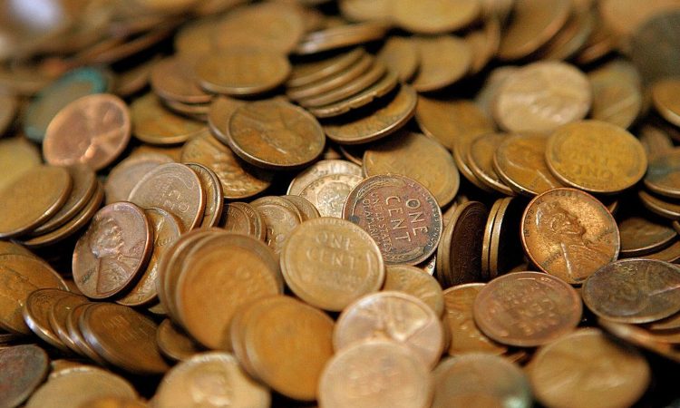 Tante monete sovrapposte da one cent