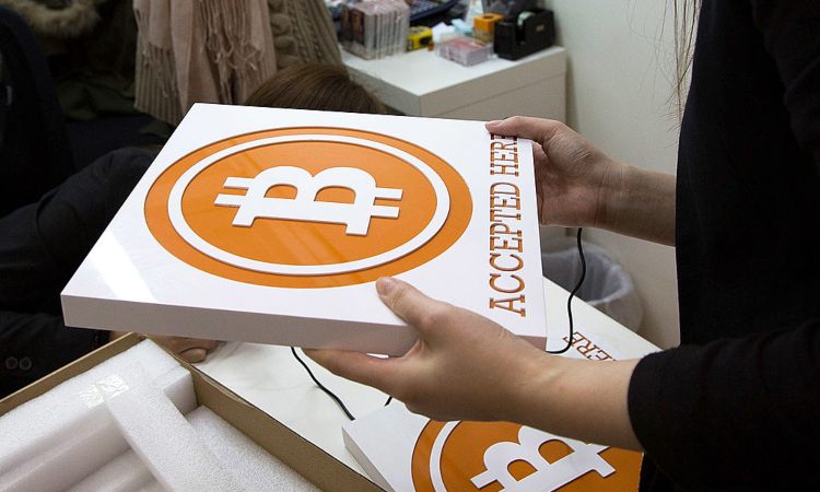 Una scatola con sopra il simbolo dei BTC