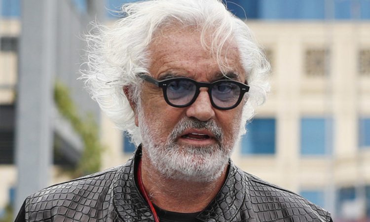 Flavio Briatore occhiali blu 