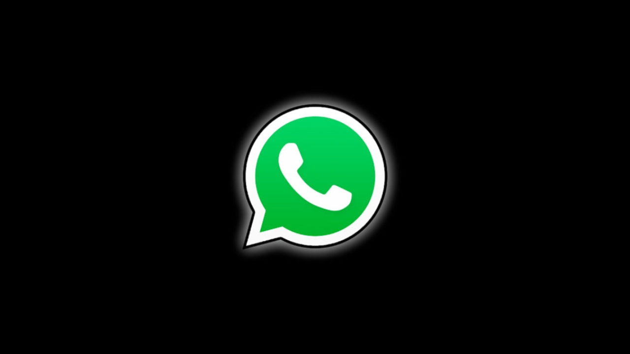 Il simbolo di Whatsapp in verde e sfondo nero