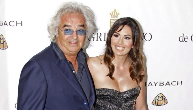 Eli sorride con Flavio Briatore