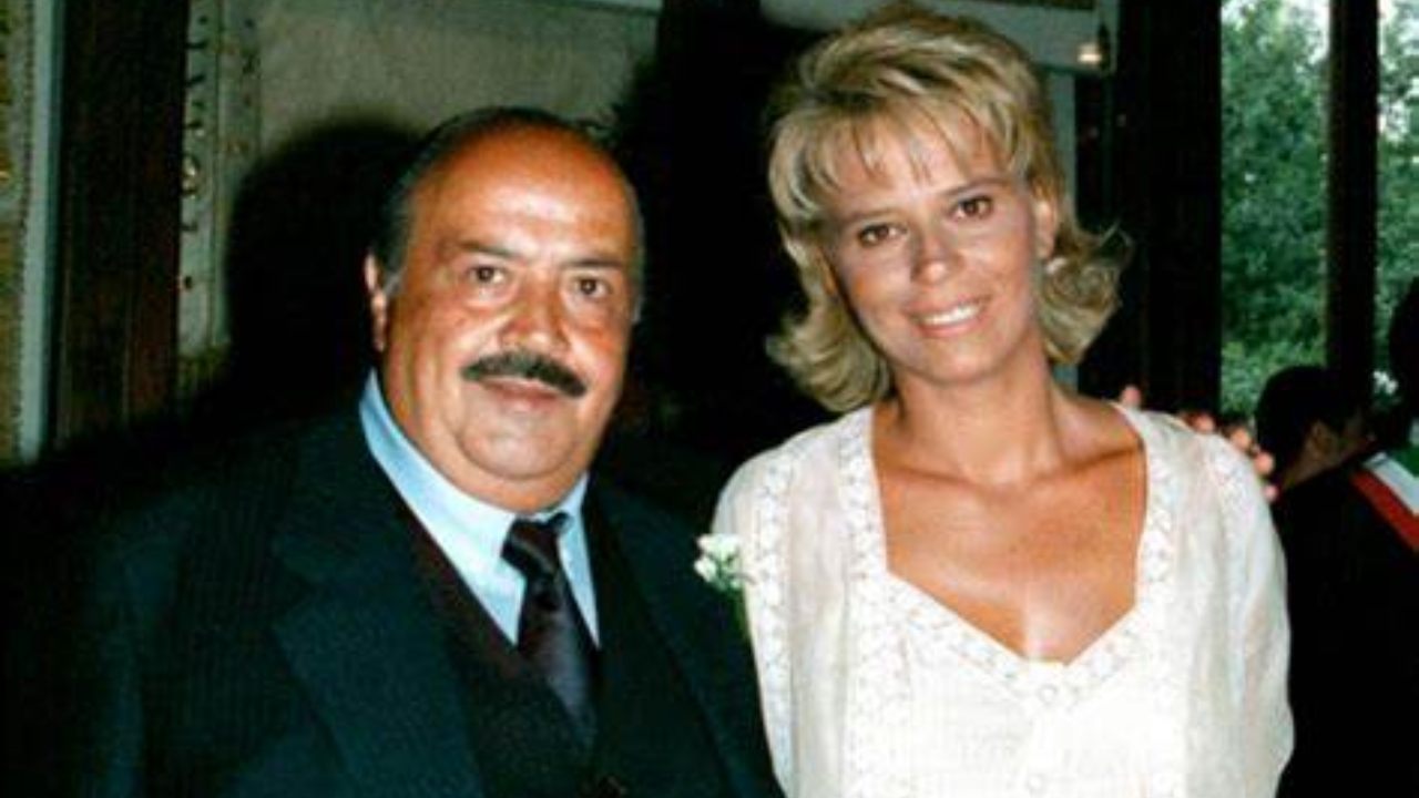 Maria e Maurizio sorridono