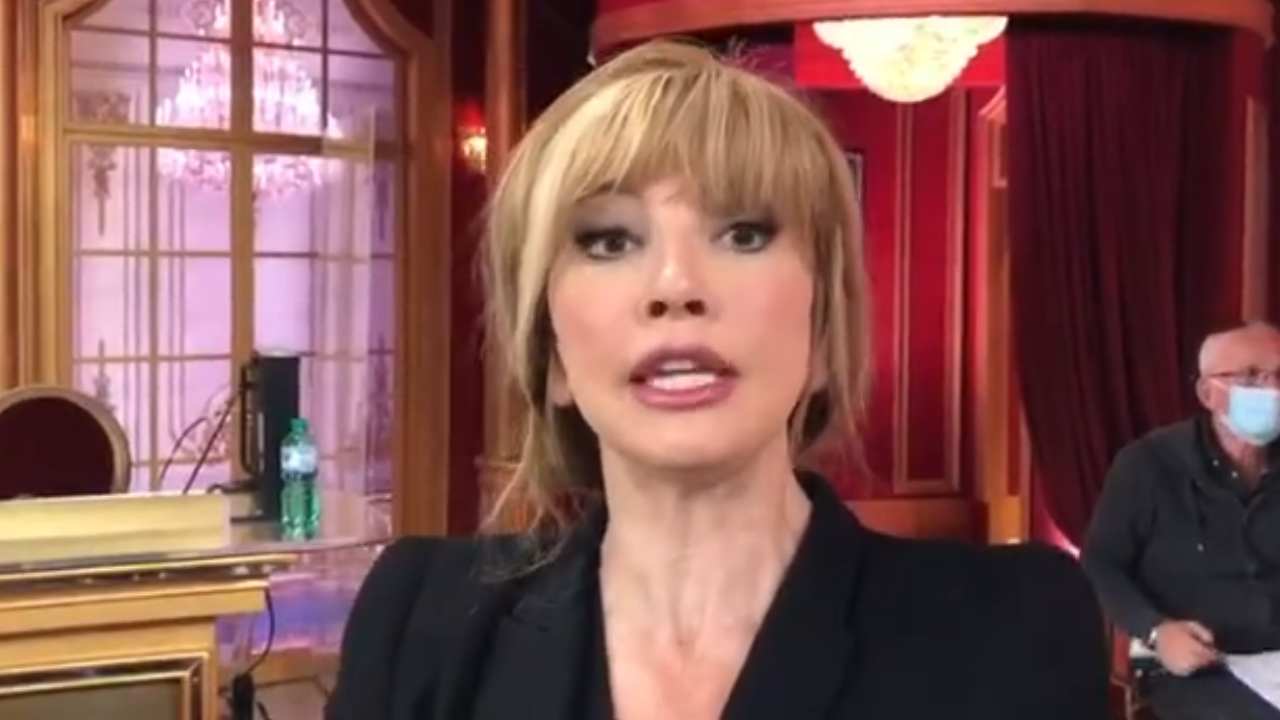 milly carlucci malattia luce sole allergia